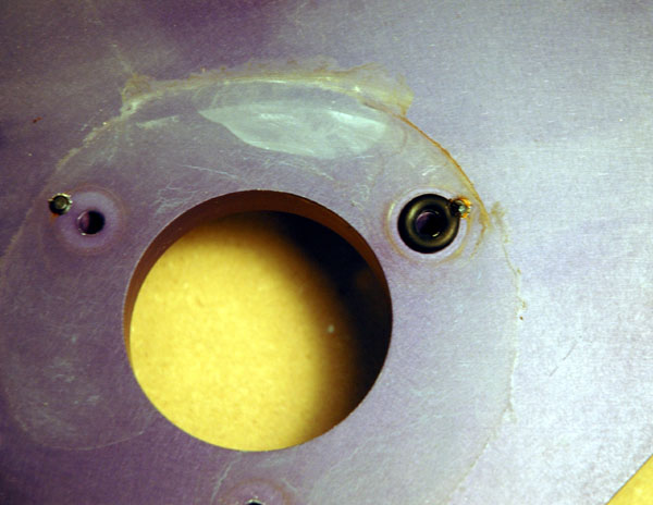 Close-up of Omni Base Plate corrosion under Spindle Housing